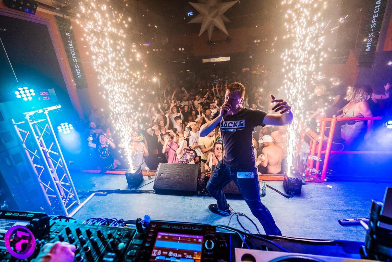Live performer on stage at The Palace Nightclub Bridgwater with packed crowd and pyrotechnics